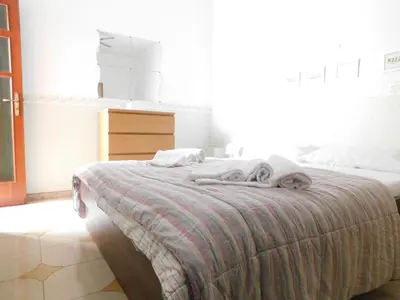 Letto o letti in una camera di Piacevole appartamento Chiaia