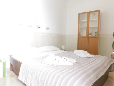 Letto o letti in una camera di Piacevole appartamento Chiaia