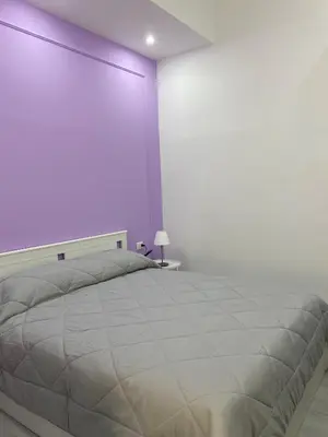 Letto o letti in una camera di Sogni di Chiaia