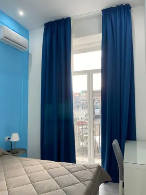 Letto o letti in una camera di Sogni di Chiaia