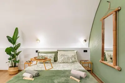 Letto o letti in una camera di Varriale house eco green parking free only small car