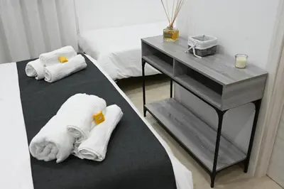 Letto o letti in una camera di Solymar B&B