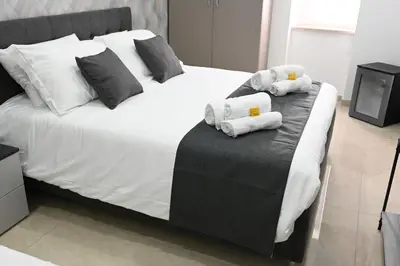 Letto o letti in una camera di Solymar B&B