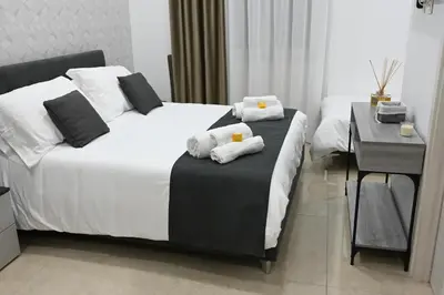 Letto o letti in una camera di Solymar B&B