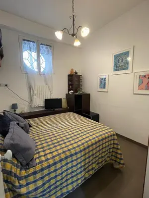 Letto o letti in una camera di Suite del Plebiscito