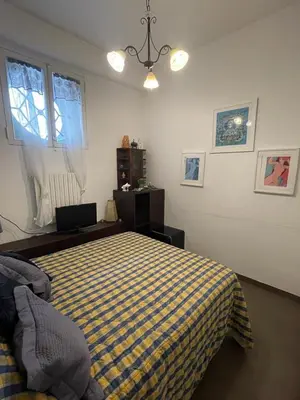 Letto o letti in una camera di Suite del Plebiscito