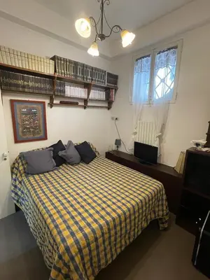 Letto o letti in una camera di Suite del Plebiscito