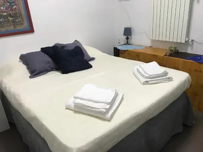 Letto o letti in una camera di Suite del Plebiscito