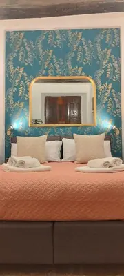 Letto o letti in una camera di Civico 18 Suite