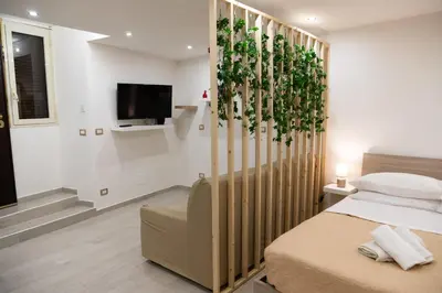TV o dispositivi per l'intrattenimento presso Il Basso Mini Apartment
