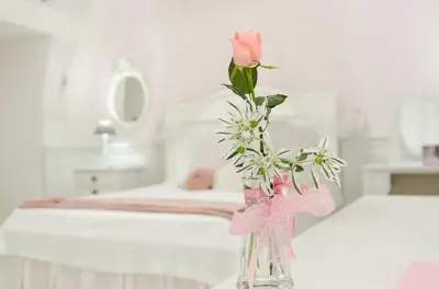 Letto o letti in una camera di Domus Rosa