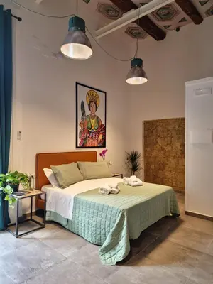 Letto o letti in una camera di Borgo Dei Miracoli