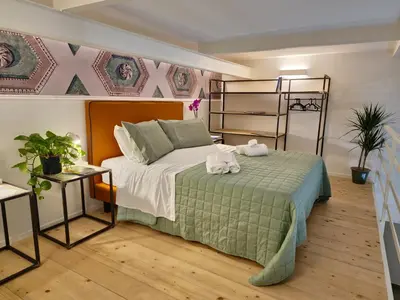 Letto o letti in una camera di Borgo Dei Miracoli