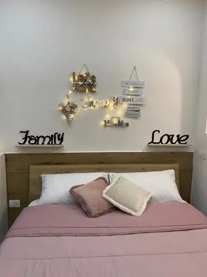 Letto o letti in una camera di La Mea Partenope