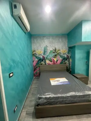 Letto o letti in una camera di C.D.M