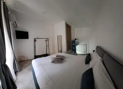Letto o letti in una camera di Stop al Duomo