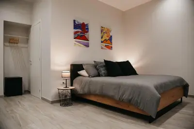 Letto o letti in una camera di Terra Mia Suite - Je so' pazzo