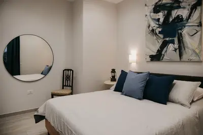 Letto o letti in una camera di Terra Mia Suite - Chi tene' o mare