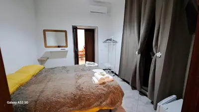 Letto o letti in una camera di AURORA e DAD Naples Center B&B