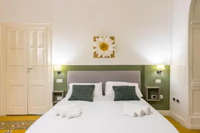 Letto o letti in una camera di Kea Home, entire house in the heart of Naples