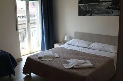 Letto o letti in una camera di Keira house Napoli