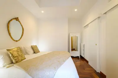 Letto o letti in una camera di Casa Bianca Apartments