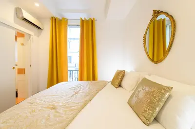 Letto o letti in una camera di Casa Bianca Apartments
