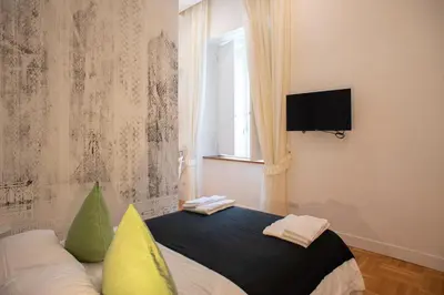 Letto o letti in una camera di Pignatelli Rooms