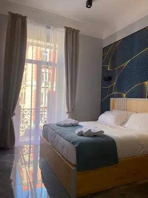 Letto o letti in una camera di Be Italian Flat Sanfelice