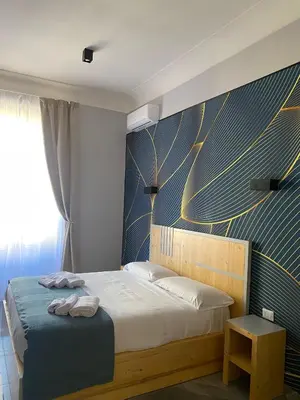 Letto o letti in una camera di Be Italian Flat Sanfelice