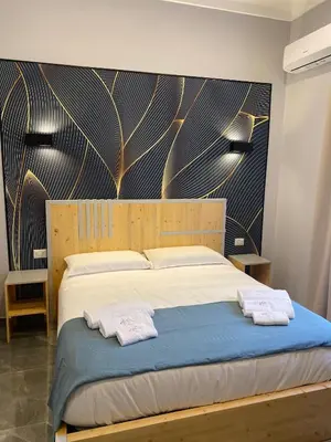 Letto o letti in una camera di Be Italian Flat Sanfelice