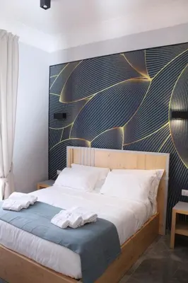 Letto o letti in una camera di Be Italian Flat Sanfelice