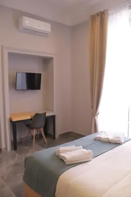 Letto o letti in una camera di Be Italian Flat Sanfelice
