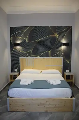 Letto o letti in una camera di Be Italian Flat Sanfelice