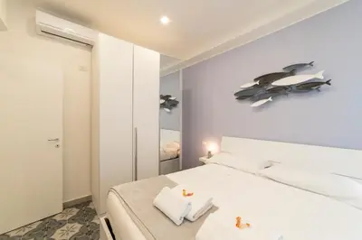Letto o letti in una camera di Dimora de' Marinari