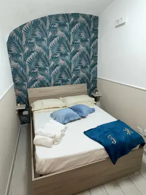 Letto o letti in una camera di Titti House