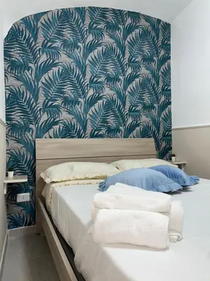 Letto o letti in una camera di Titti House