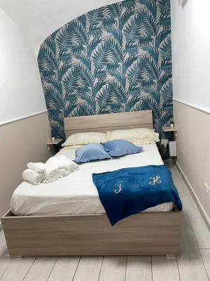 Letto o letti in una camera di Titti House