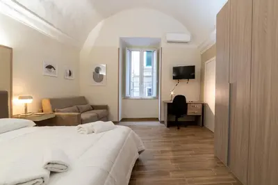 Letto o letti in una camera di Villari 48 Apartment - Appartamento 1