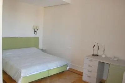 Letto o letti in una camera di Residence gli Angioini srl
