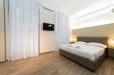 Letto o letti in una camera di Villari 48 Apartment - Appartamento 2