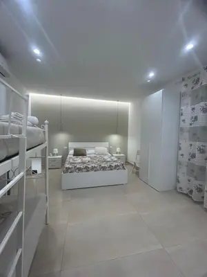 Letto o letti in una camera di Casa Vacanze Angela
