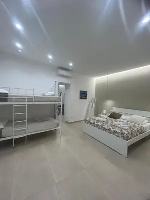 Letto o letti in una camera di Casa Vacanze Angela