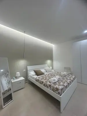 Letto o letti in una camera di Casa Vacanze Angela