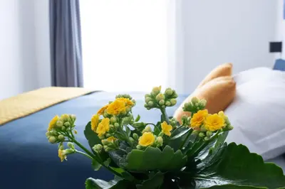 Letto o letti in una camera di Napoli Oltre Rooms