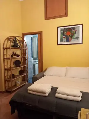 Letto o letti in una camera di Casetta Palmarice Centro Storico