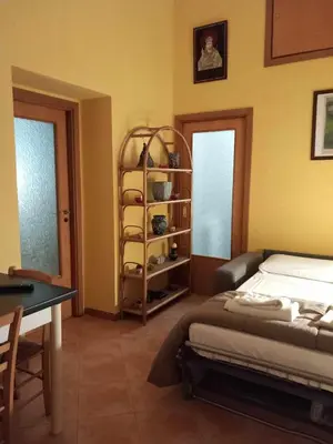 Letto o letti in una camera di Casetta Palmarice Centro Storico