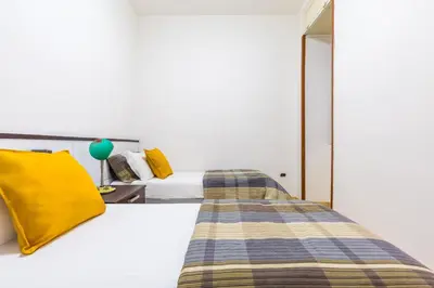 Letto o letti in una camera di Al Borgo Orefici Apartment by Wonderful Italy