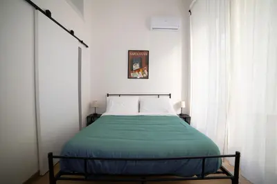 Letto o letti in una camera di B&B 4CELLA