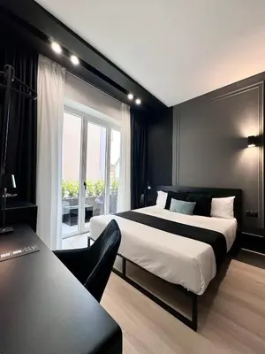 Letto o letti in una camera di Gallerie Boutique Rooms